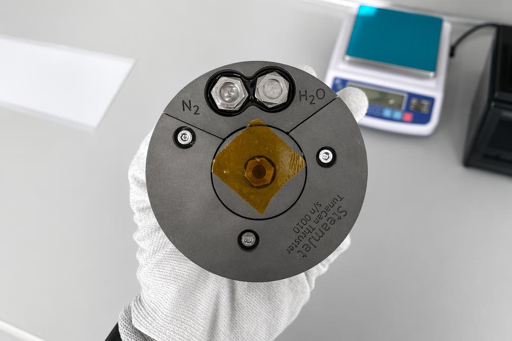 Water-based CubeSat propulsion system managing phase change and freezing in orbit